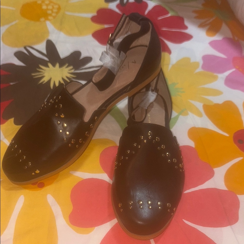 Anthropologie Black and Gold Flats with Brogue Detailing
